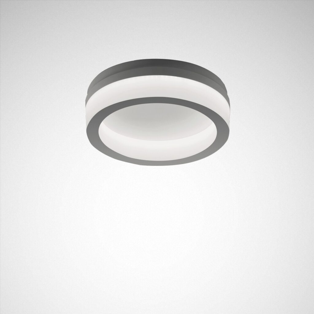 Takmonterad rund LED-armatur med mattgrå ring och mjukt diffust ljus, modern energieffektiv design som ger jämnt bländfritt ljus i kontor, korridorer och hem, perfekt för projekt och återförsäljning hos PROLJUS AB