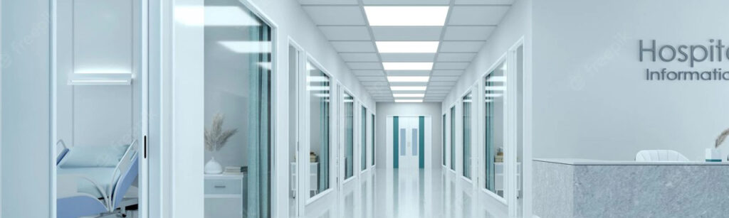 Jämnt upplyst sjukhuskorridor med rader av infällda rektangulära LED-armaturer i taket som ger bländfri, energieffektiv och hygienisk belysning, välj PROLJUS AB för hållbara högkvalitativa armaturer