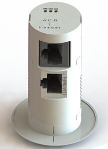 Cylindrisk vit infälld armaturanslutningsmodul med två portar, stilren och kompakt design som framhäver PROLJUS AB:s moderna belysningsarmaturer och förenklar snabb professionell installation