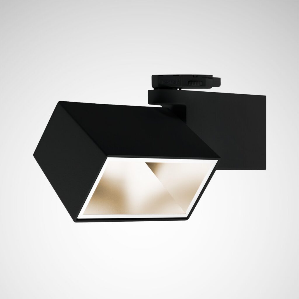 Svart hexagonformad spårarmatur med infälld varmvit LED-reflektor och flexibel fästanordning, stilren och energieffektiv belysning för butik, kontor och utställningar från PROLJUS AB